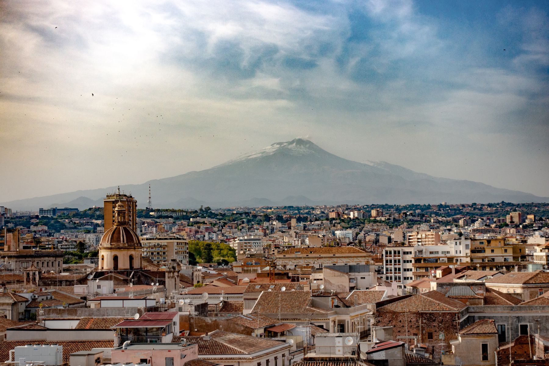 Catania with Mount Etna visible above the city