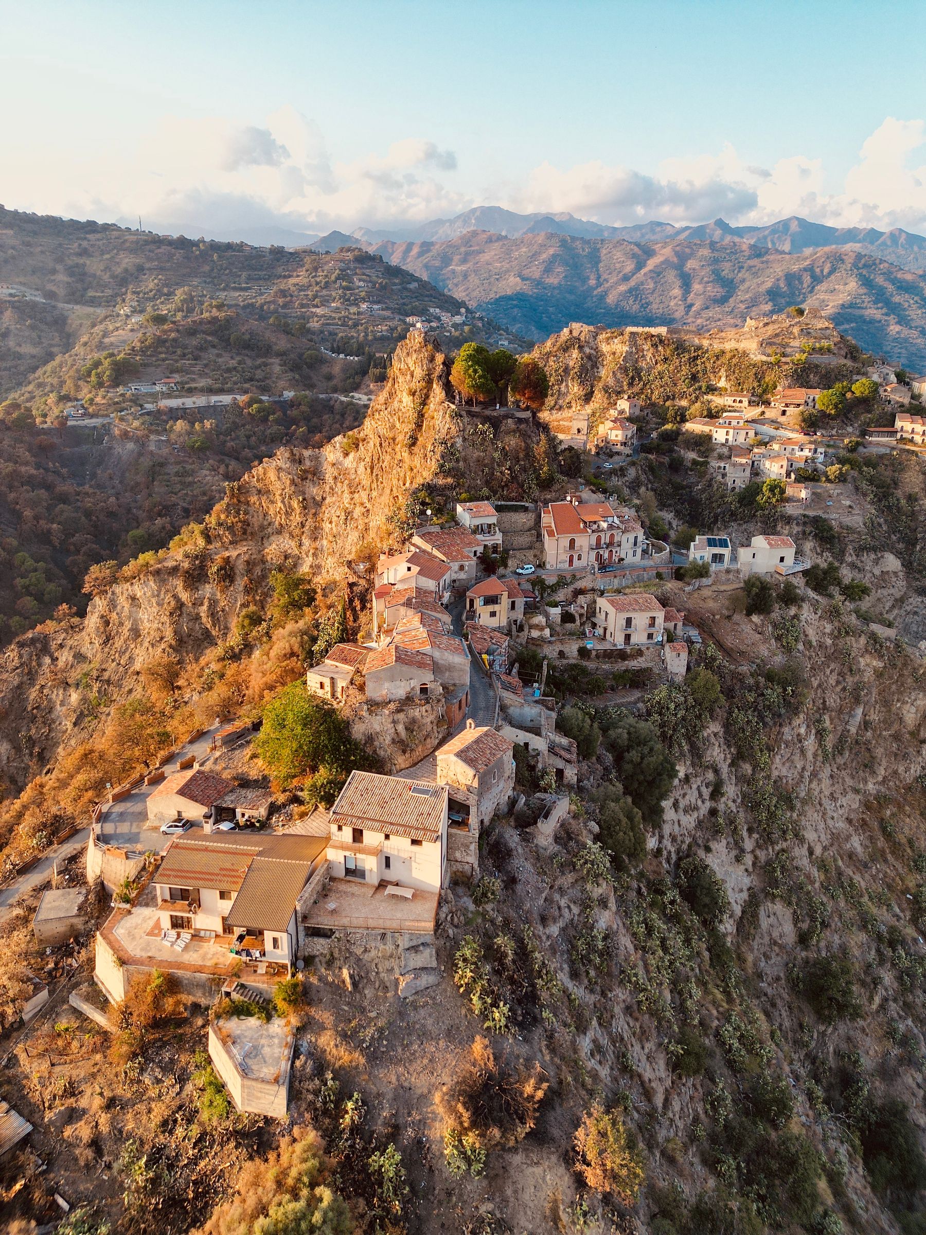 Savoca’s houses and churches on a steep ridge above the Sicilian coast
